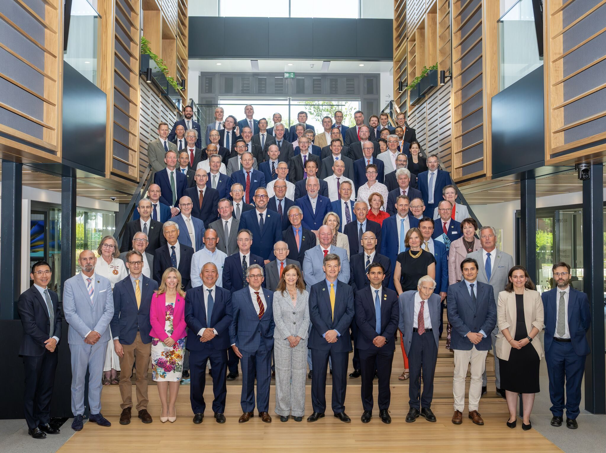 Delegates to the inaugural Frank Whittle Summit assembled on the staircase of the New Whittle Laboratory, University of Cambridge.